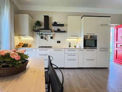 APPARTAMENTO IN VILLA CON GIARDINO
