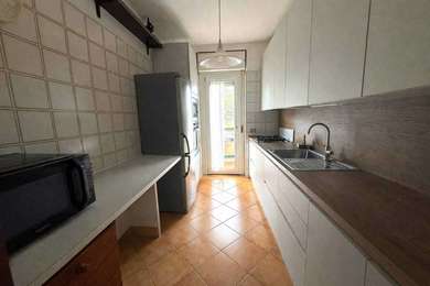 ATTICO CON TERRAZZE E POSTO AUTO