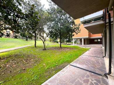 ATTICO CON TERRAZZE E POSTO AUTO